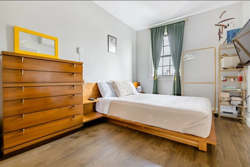 King Sized Main Bedroom with En Suite Bathroom with Solid Wood Mid Century Modern Furnishings - 504 Maple St