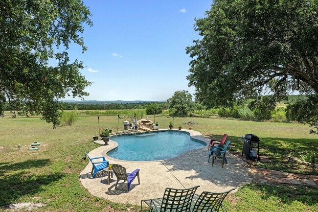 Building Photo - Serene Oasis on Nearly 2 Acres With a Pool!!