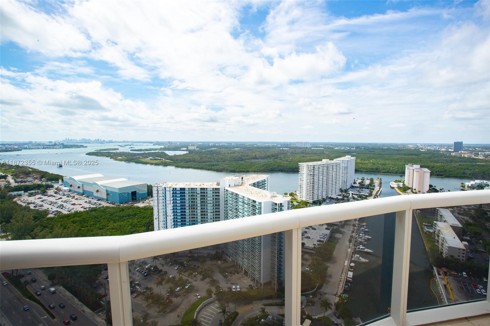 Building Photo - 15811 Collins Ave