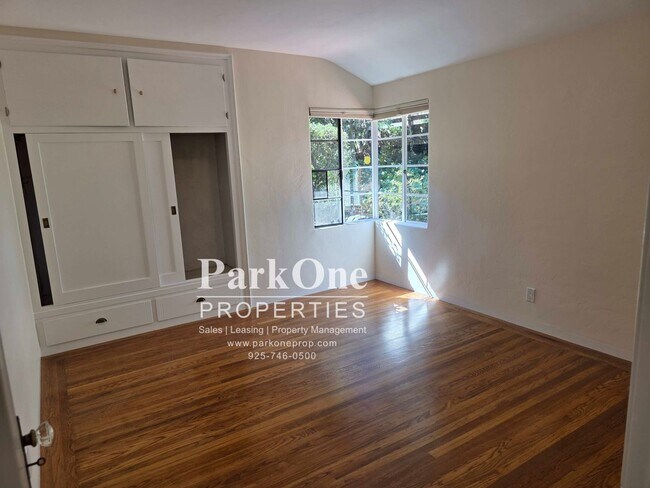 Building Photo - Spacious Home on a Private Wooded Lot Now Available!