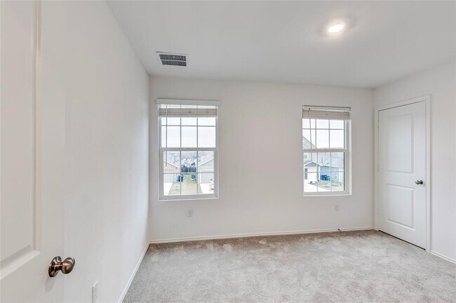 Building Photo - 7706 Poppy Petal Dr