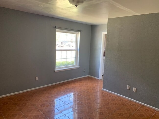 Building Photo - Southwest Lubbock Clean 3/2/2 with nice yard!