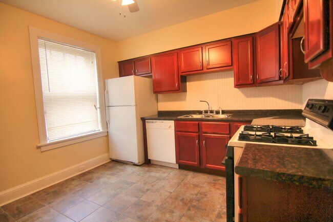 Building Photo - This 2 bedroom 1 bath home has been completely refinished with brilliant hardwood floors throughout!