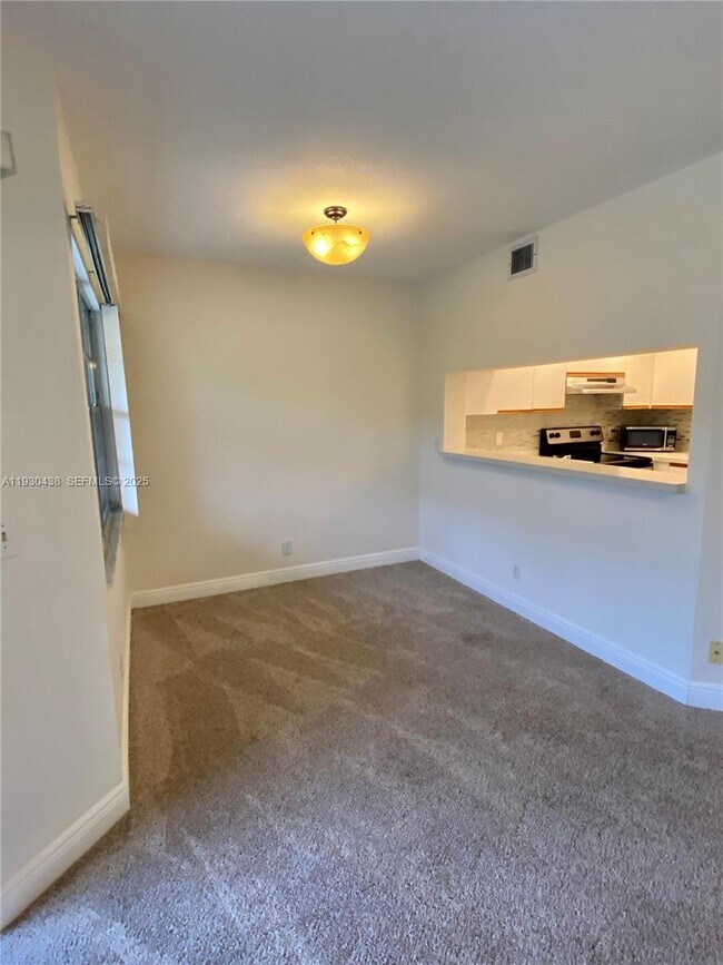 Building Photo - 12850 SW 4th Ct