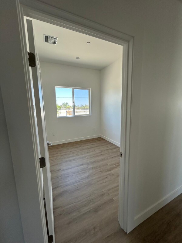 Building Photo - 9306 E Ave T 6