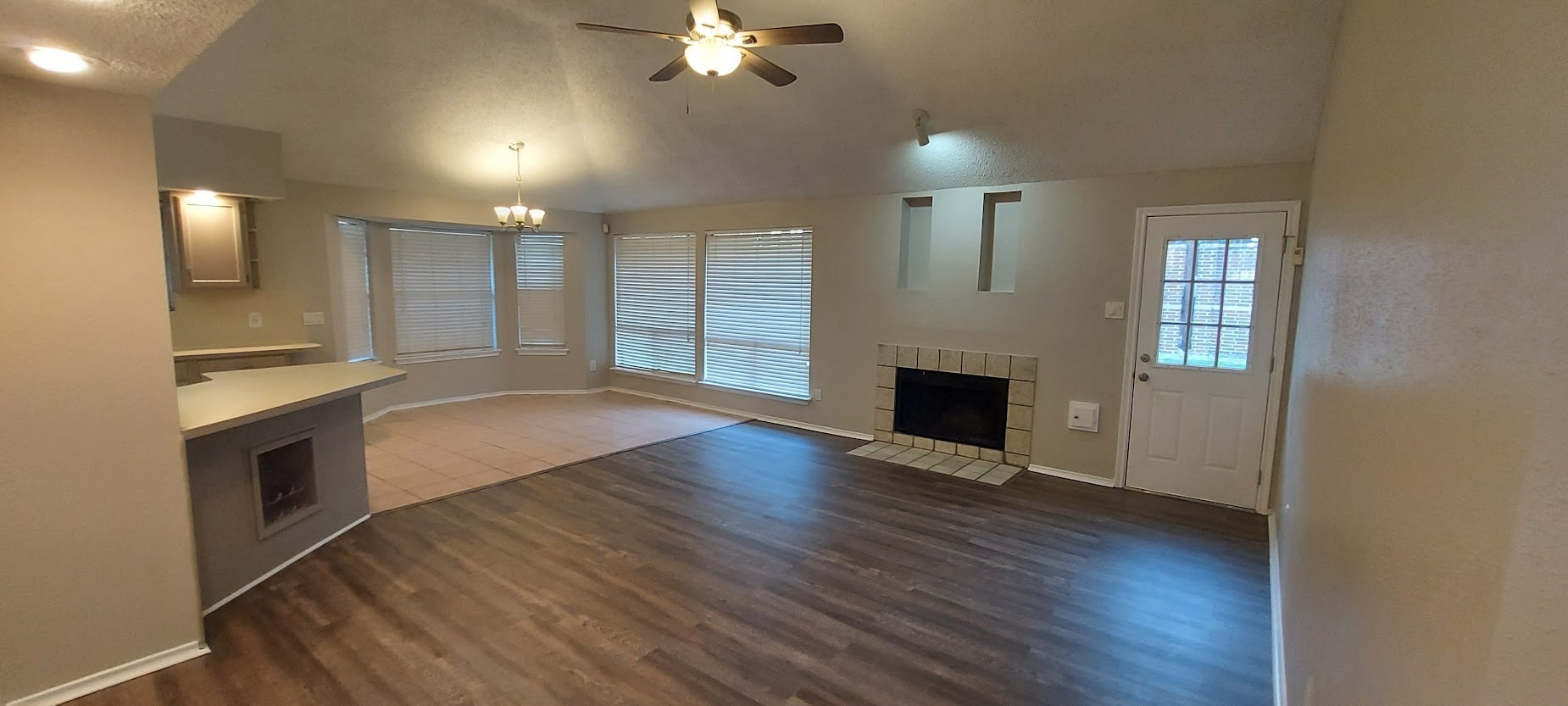 The Dining Area and Shared Fireplace of the Family Room - 2734 Indian Trail Dr