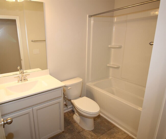 Upstairs hall bathroom that services spare bedrooms. - 3406 Dropseed Dr