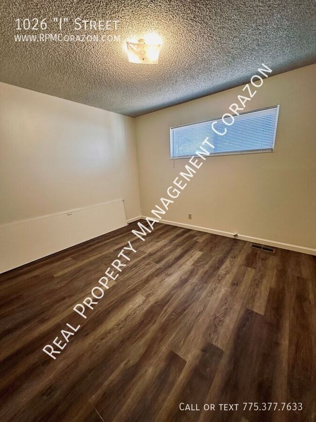 Building Photo - NEW... Plank flooring, carpet, paint, and ...