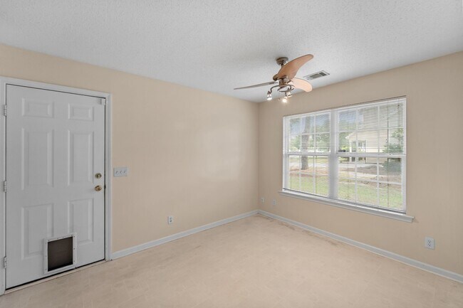 Building Photo - Beautiful 4-Bedroom Home with Lagoon Views in Pooler's Arbors at Godley Station