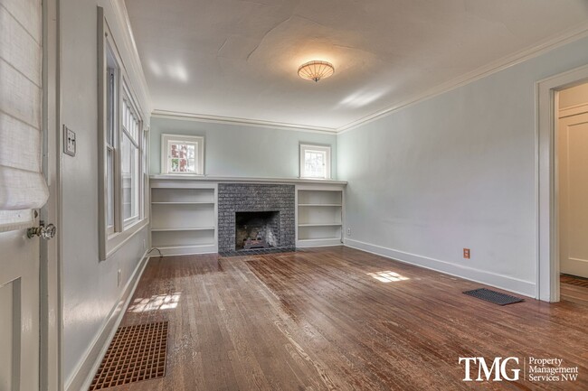 Building Photo - Updated 1928 Tutor w/ Original Touches and Large Fully Fenced Back Yard