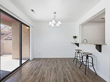Building Photo - Beautifully remodeled and move in ready, this updated 1-bed, 2-bath condo sits in the heart of do...