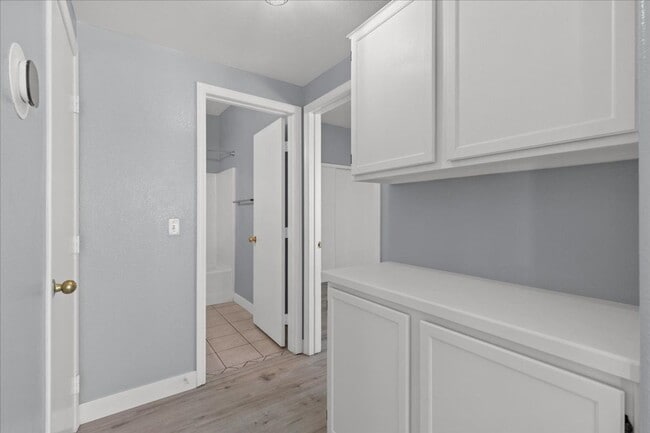 Building Photo - Sleek 2 Bedroom Condo with 2 Car Garage Ne...
