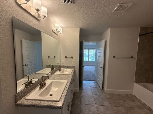 Building Photo - Truly Stunning 4-bedroom, 3-bathroom, 2 car garage in the beautiful new community of Villimar