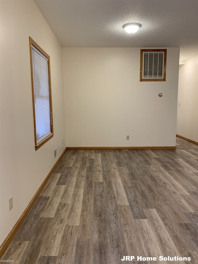Building Photo - 2 br, 1 bath Apartment - 6400 Gillis Dr Ste A