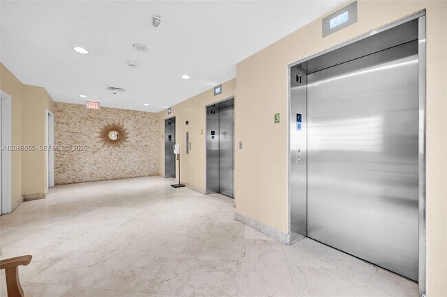 Building Photo - 6767 Collins Ave