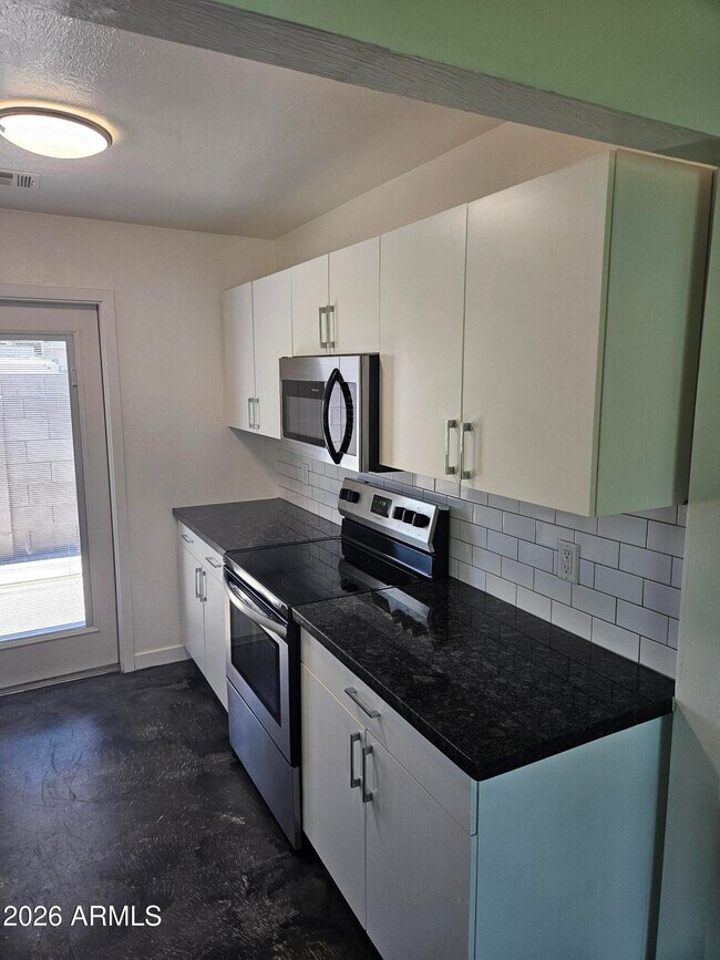 Building Photo - 1511 E Rovey Ave