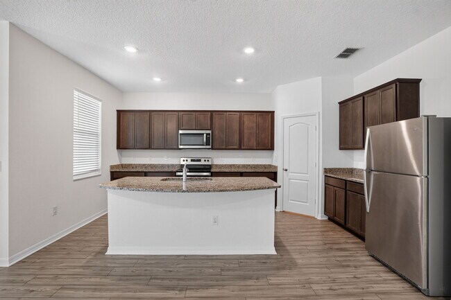Building Photo - 6170 Dolostone Dr