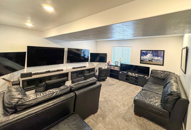 Building Photo - Modern 4 Bed 3.5 Bath Home in Syracuse | Bonus Room + Fenced Yard + 86” TV Included