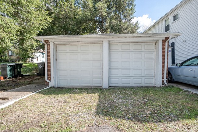 Building Photo - This renovated family friendly home will e...