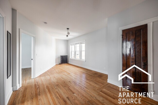 Building Photo - 4011 N Lowell Ave