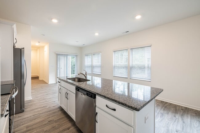 Building Photo - Beautiful 3 Bedroom Townhome Main Street Downtown Pineville - MOVE IN READY