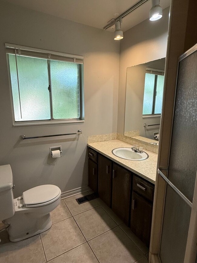 Building Photo - Beautiful town home with deep 2 car garage and a large covered patio