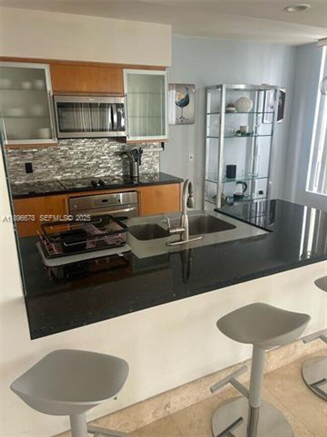 Building Photo - 6365 Collins Ave