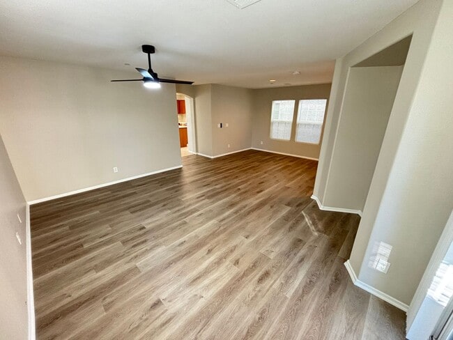 Building Photo - Spacious Tri-Level 4-Bedroom Home with Bal...