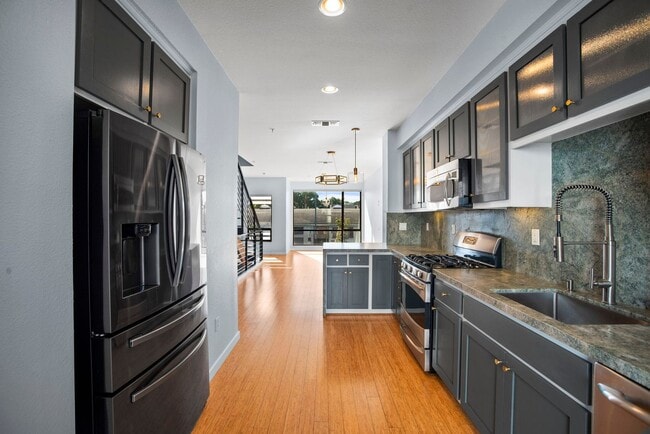 Building Photo - Townhome with EV Ready Garage!