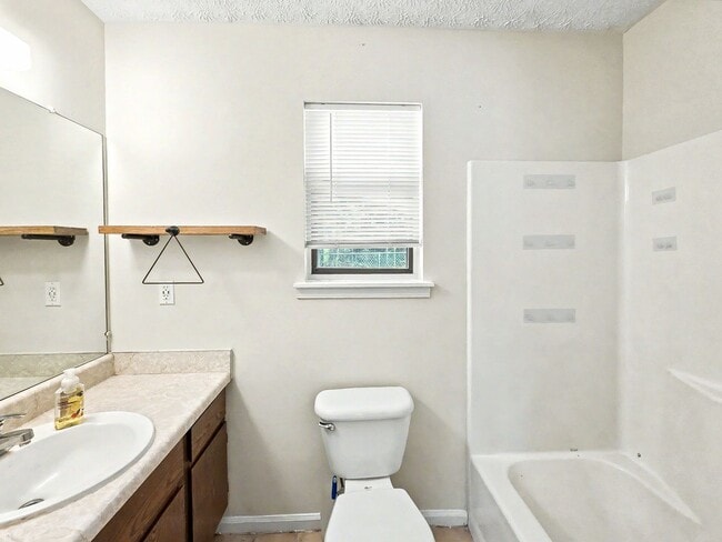 Building Photo - Tibbitts Drive Duplex