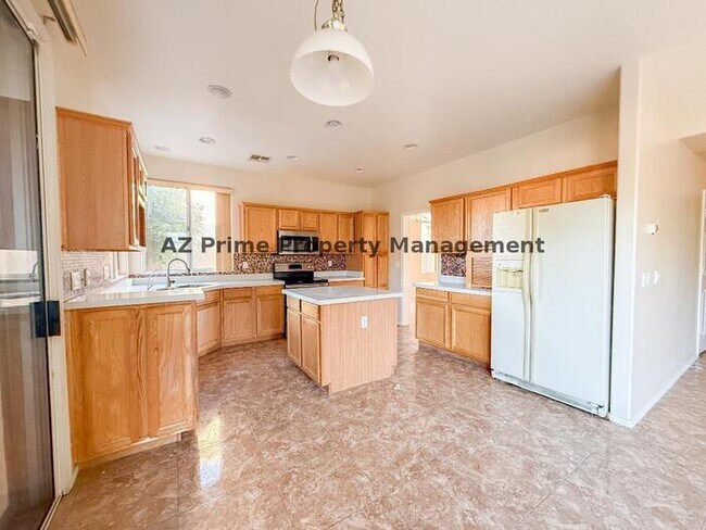 Building Photo - 6874 W Blackhawk Dr