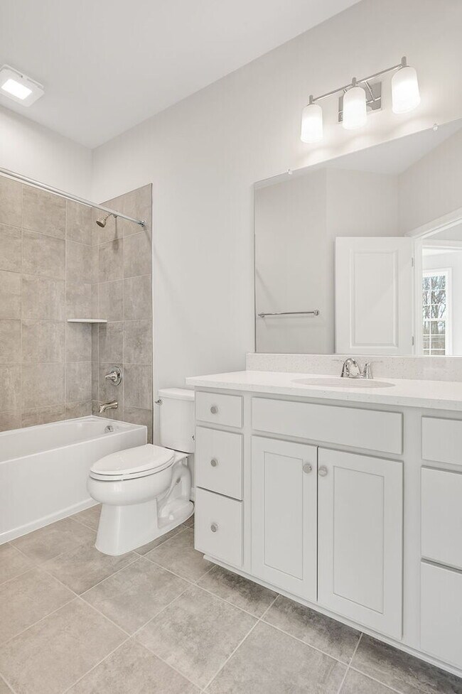 Building Photo - Be the First to Live Here! Brand-New 3BR Condo in Coalfield Station – Modern Living in the Heart ...