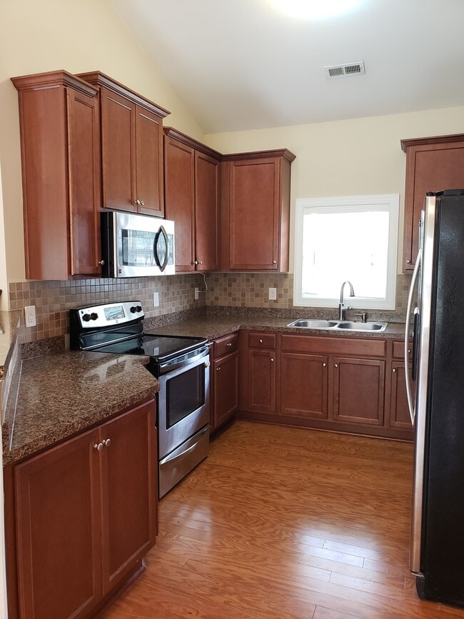 Building Photo - Dazzling 3 Bedroom Home with Bonus Room, Fenced Backyard! Located in Cooper Farms!