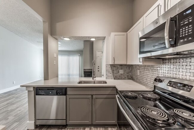 Building Photo - Modern Feels, Warm Heart