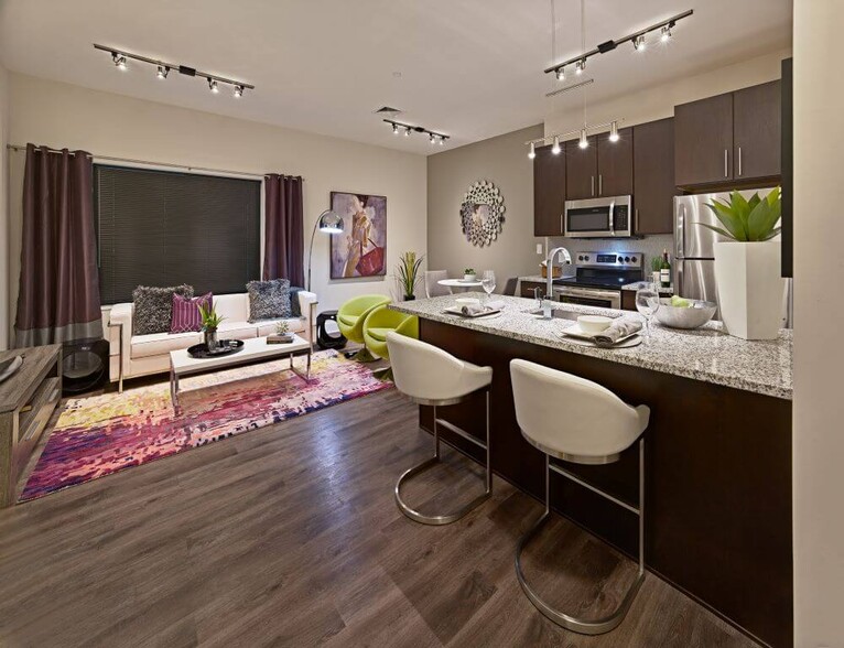 1-final-westrum-dev-800-luxor-lane-model-kitchen-seating-and-eating-areas-from-entrance-3-1 - Nexus Apartments