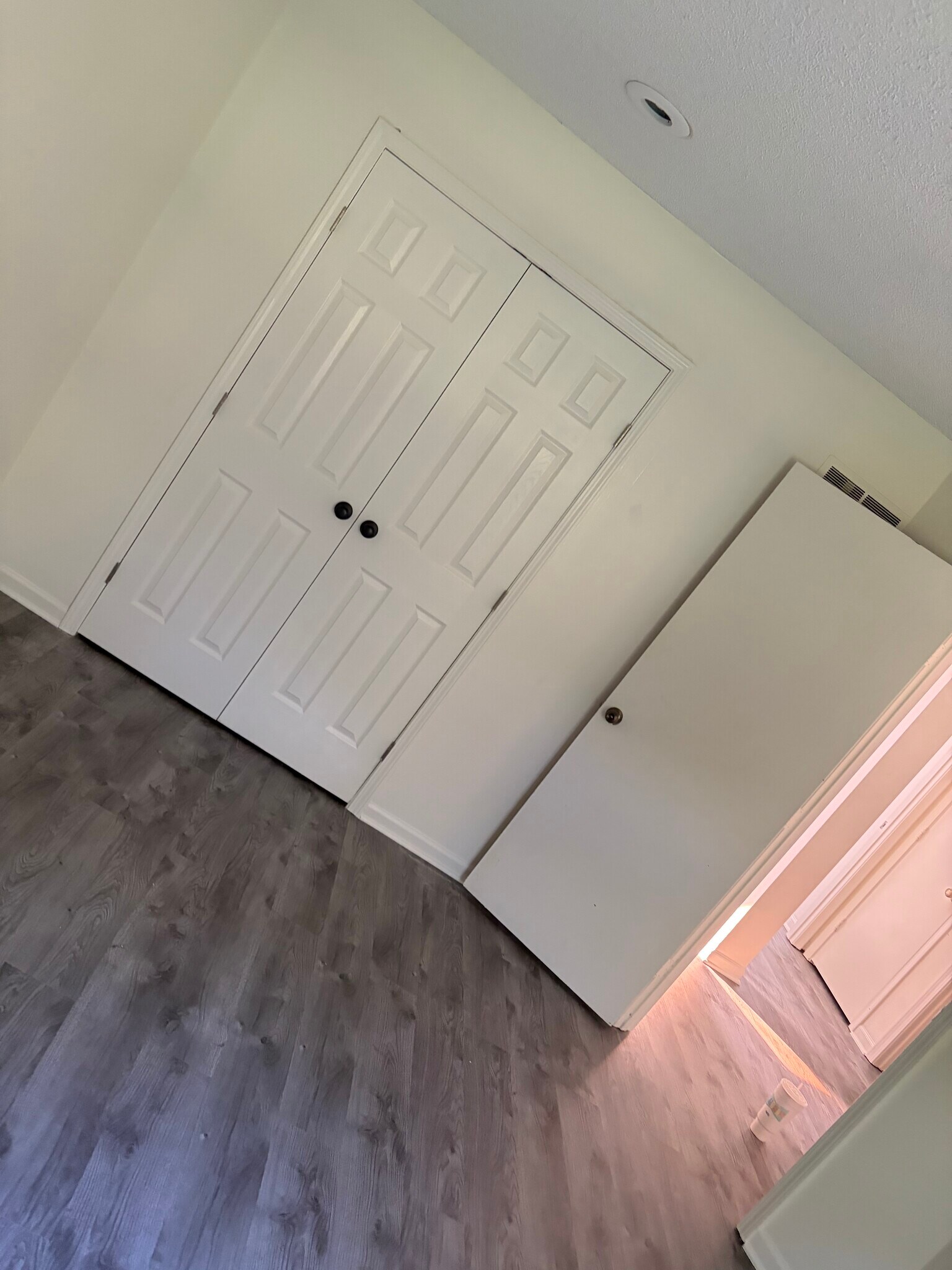 Bedroom with new closet doors - 27 Cherry St