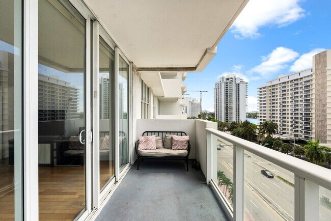 Building Photo - 5599 Collins Ave