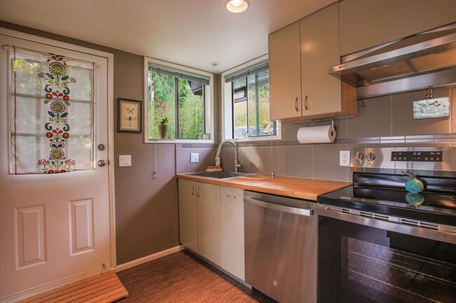 Building Photo - Lovingly Maintained with Designer Finishes...