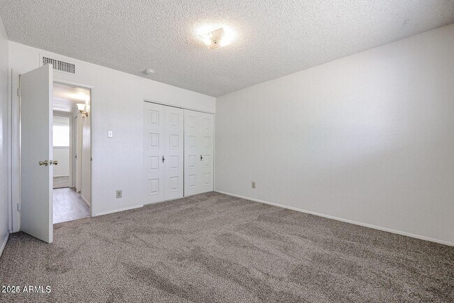 Building Photo - 5333 W Port Au Prince Ln
