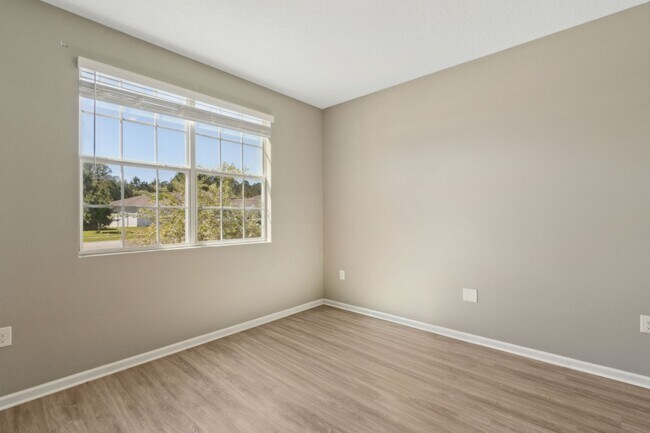 Building Photo - Spacious 5-Bedroom Home  – Prime Amelia Concourse Location!