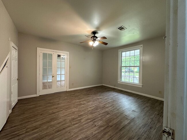 Building Photo - Welcome to this charming 3-bedroom, 2-bathroom home located in Atkins, AR