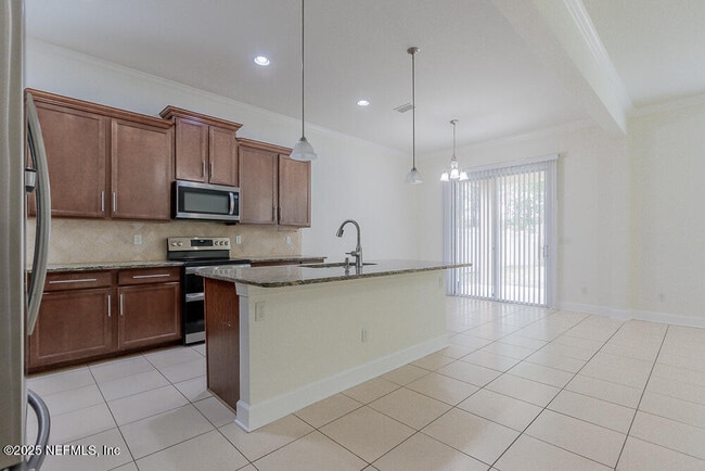 Building Photo - 4599 Plantation Oaks Blvd