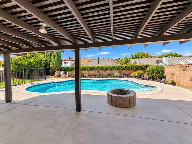 Building Photo - Available Now- 4-Bedroom Pool Home with Downstairs Bed & Bath – Centrally Located in Canyon