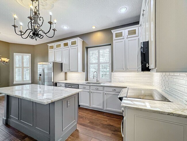 Building Photo - Stunning 5-Bedroom Home in North Village o...