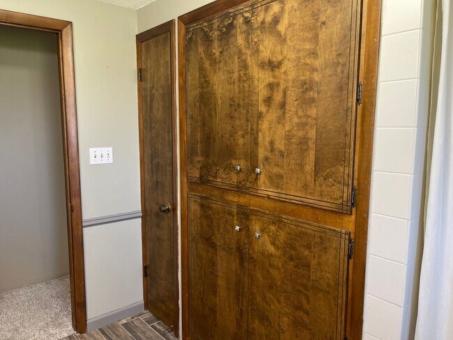 Building Photo - Spacious, four-bedroom, two-bathroom, coun...
