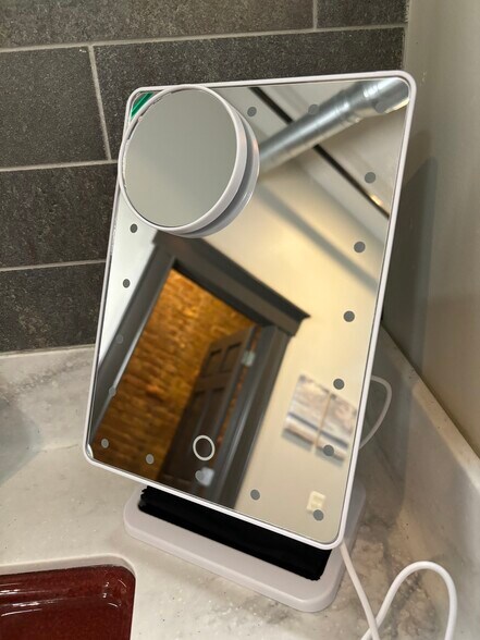Portable magnifying mirrors in master bath - 225 E Blaine Ln