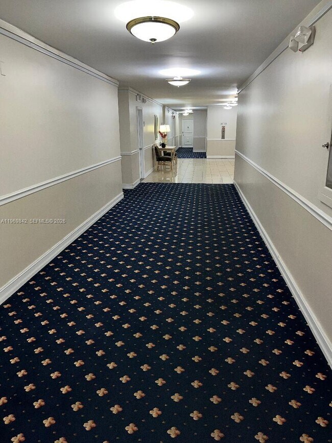 Building Photo - 5005 Collins Ave