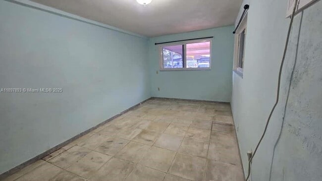 Building Photo - 701 Tamiami Canal Rd