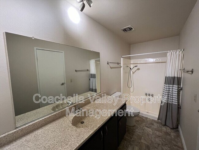 Building Photo - 1950 S Palm Canyon Dr