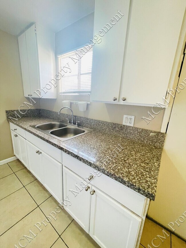Building Photo - 489-6621 Whitsett Ave